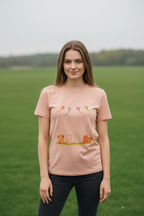 Female model in peach t-shirt with kite design - casual pose